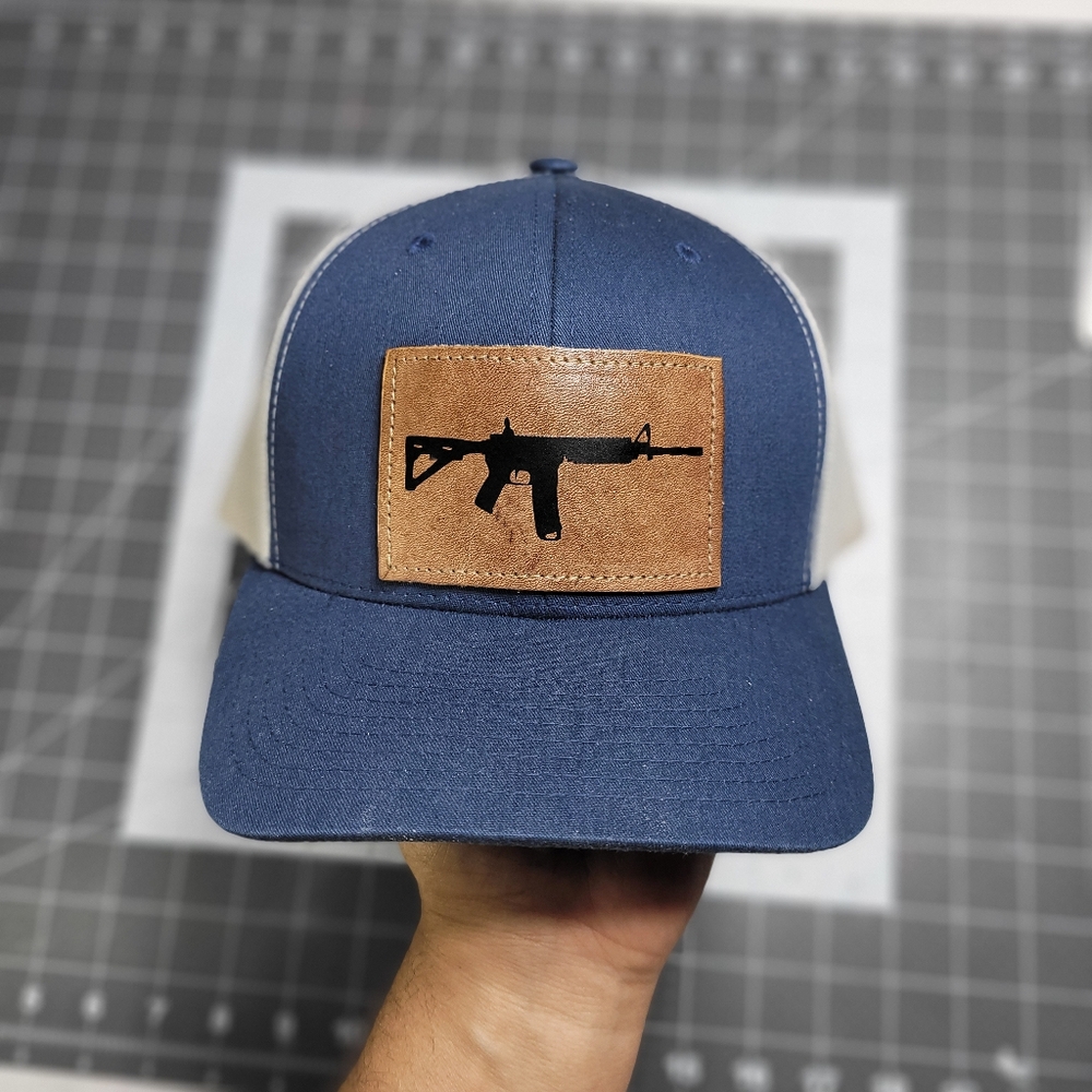 AK-47 Trucker Leather patch hat with stitched logo